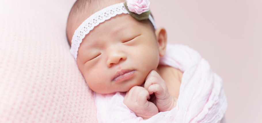 Wrapping up a newborn baby photography session