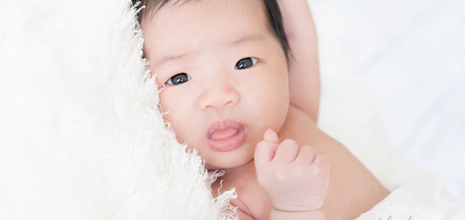 A Newborn with an adorable tiny tongue :P